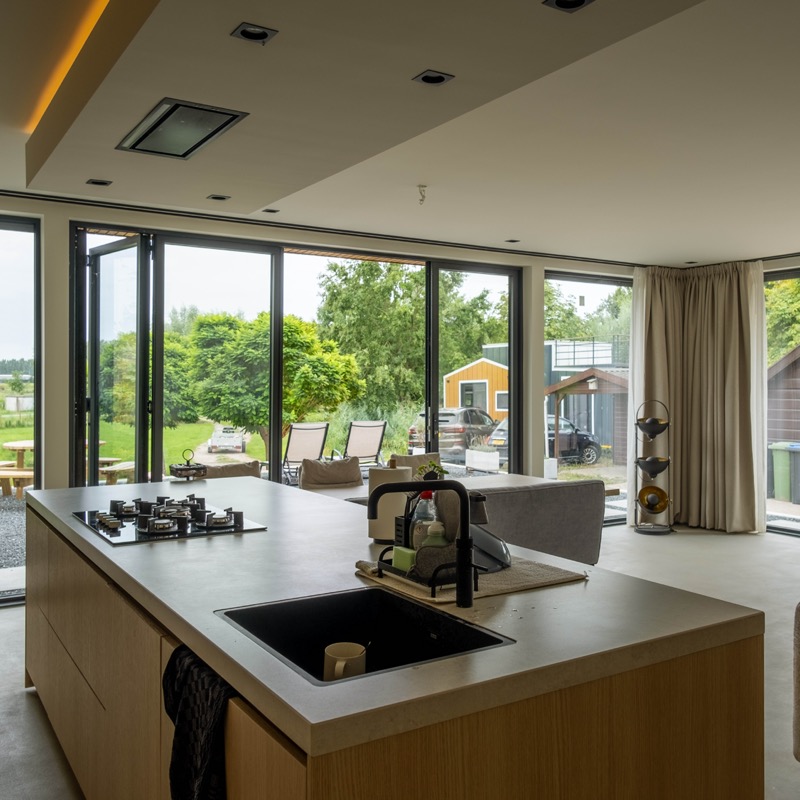 Architect interieur - dubbelhoge ruimte met moderne trap